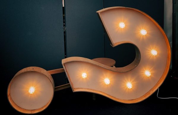 Photo by Jon Tyson white markee light